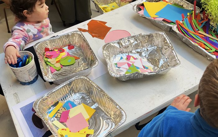Children explore art materials in a previous Little Artists Session, July 2025